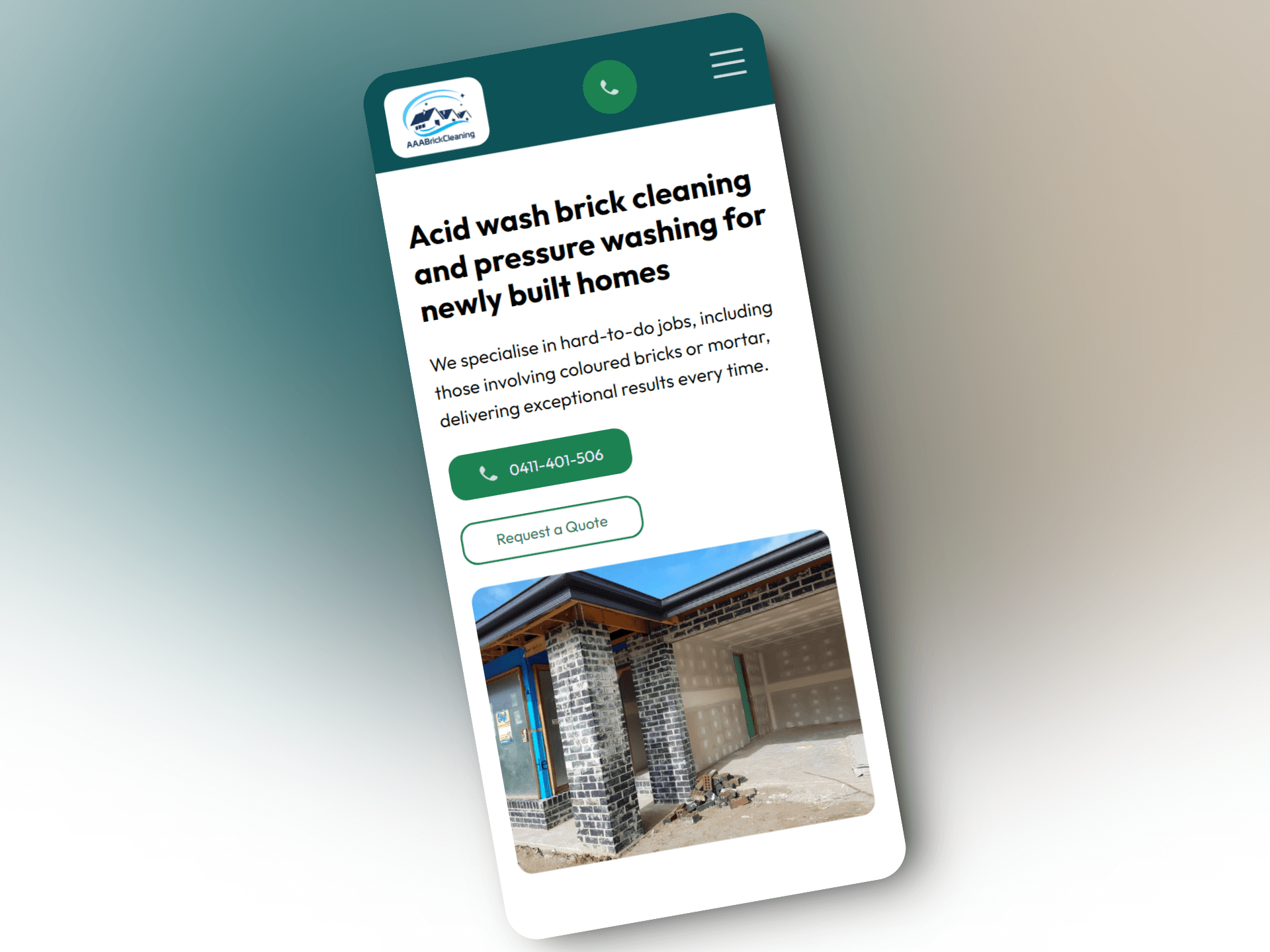 Mobile photo mockup of pressure washing business website showing homepage.